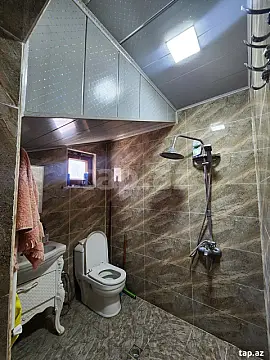 Satılır 7 otaqlı həyət evi 310.9 m²