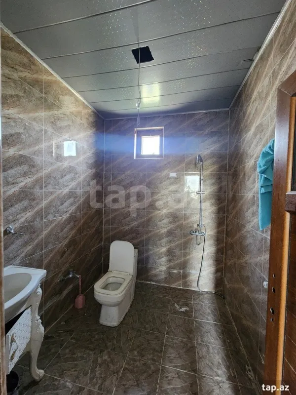 Satılır 7 otaqlı həyət evi 310.9 m²