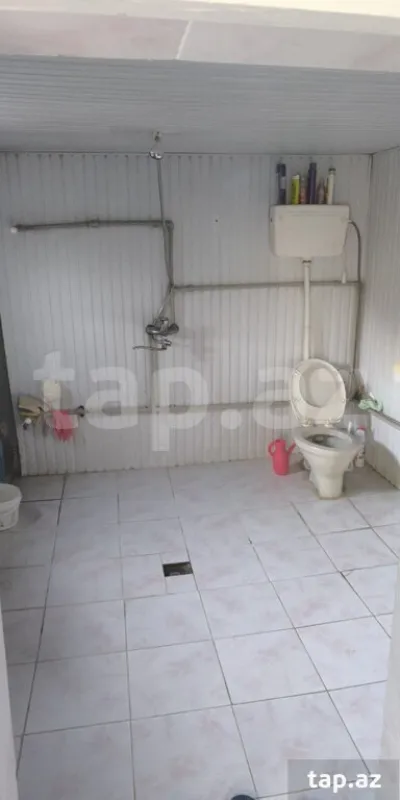 Satılır 10 otaqlı həyət evi