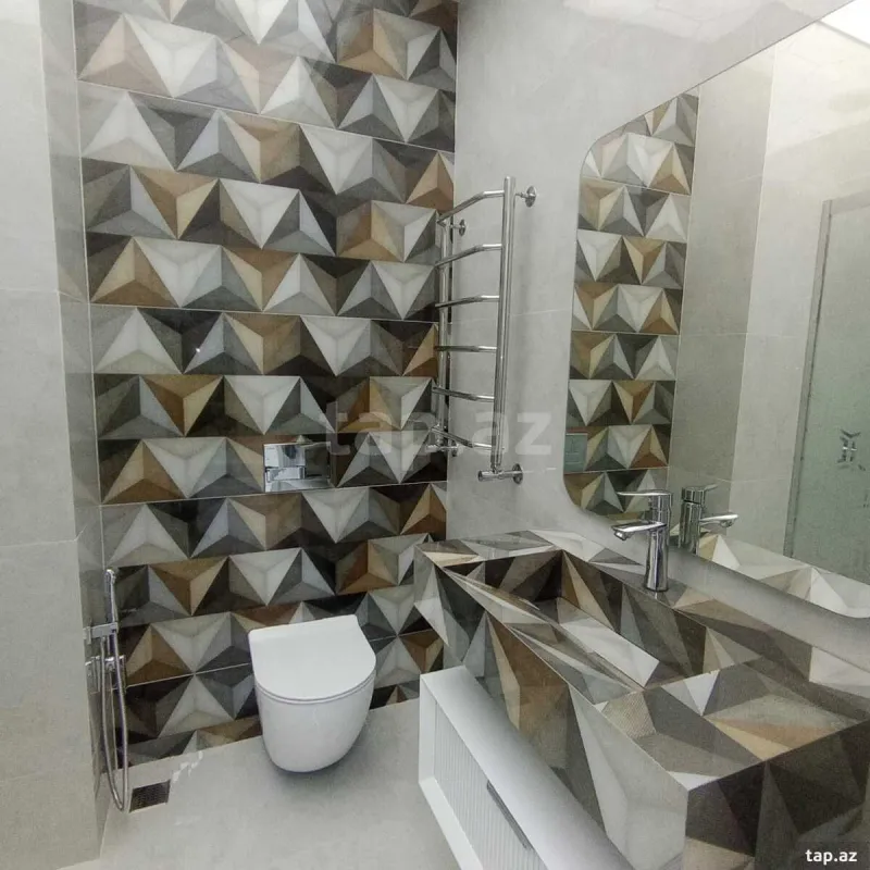 Satılır 3 otaqlı yeni tikili 130 m²