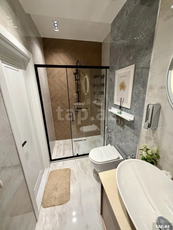 Satılır 2 otaqlı yeni tikili 60 m²