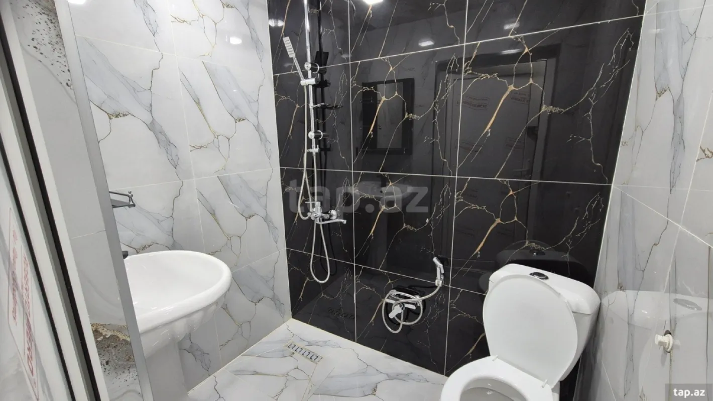 Satılır 2 otaqlı yeni tikili 61.3 m²