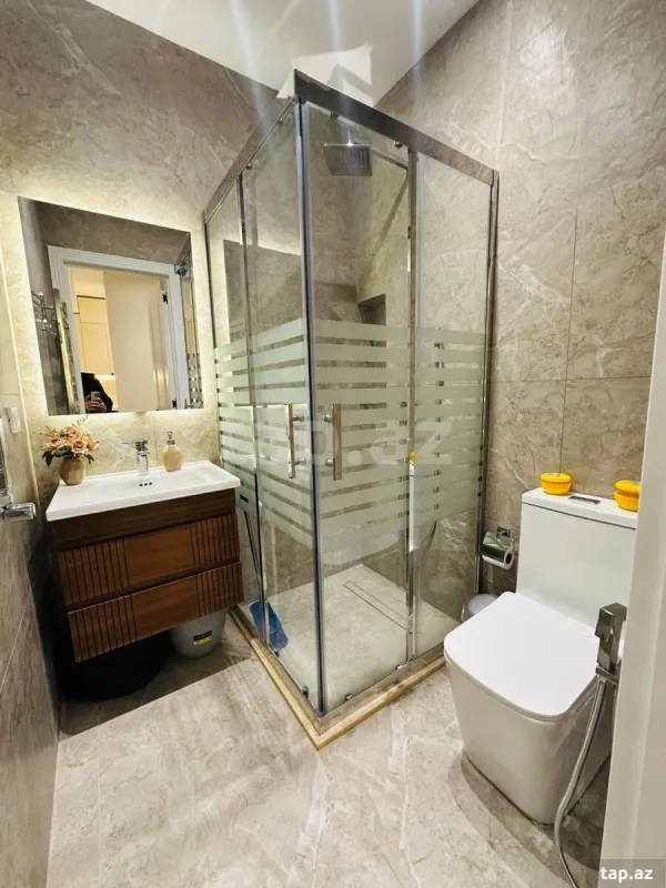 Satılır 2 otaqlı yeni tikili 64 m²