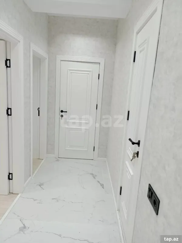 Satılır 2 otaqlı yeni tikili 65.4 m²