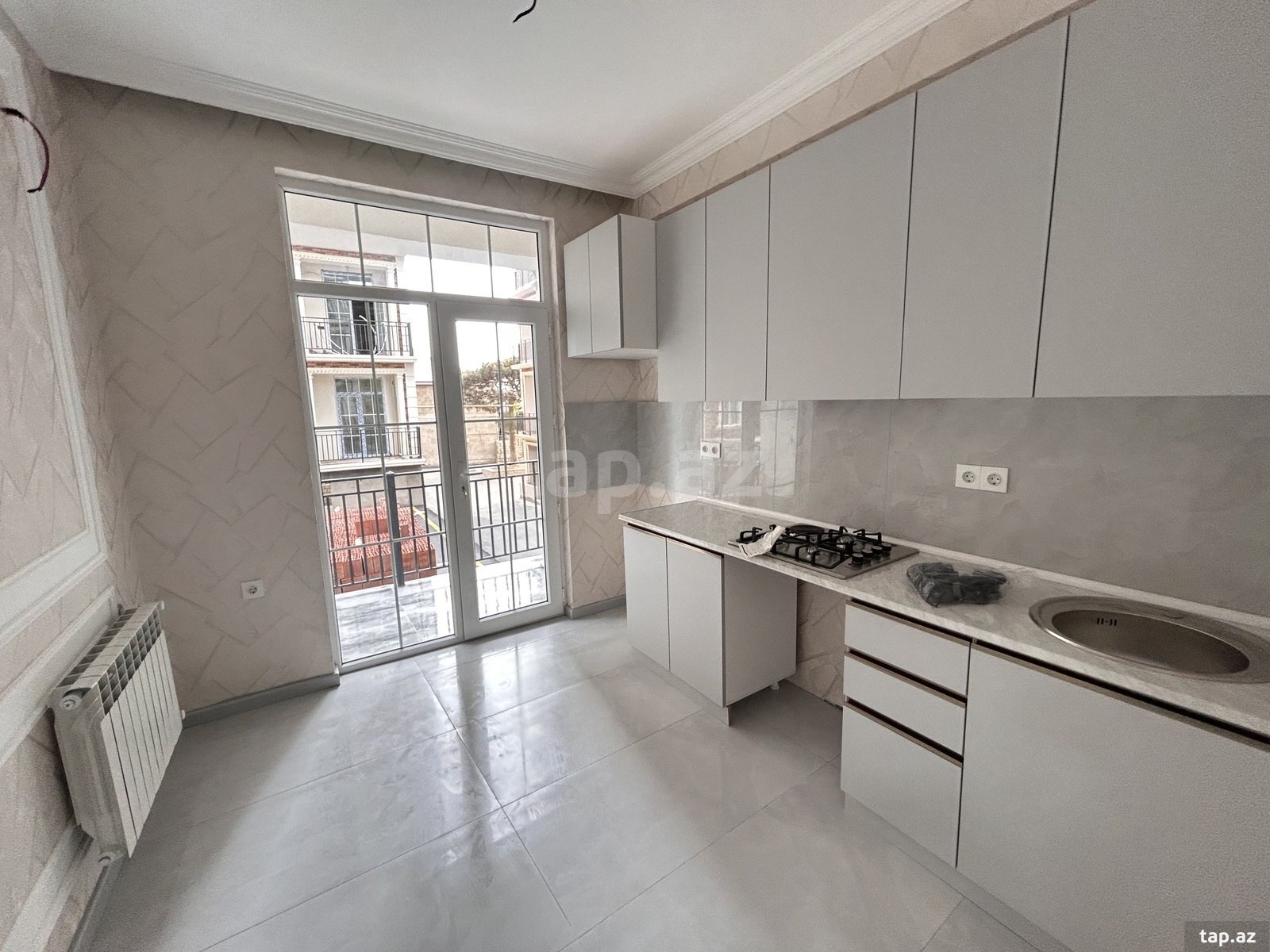 Satılır 2 otaqlı yeni tikili 61.38 m²