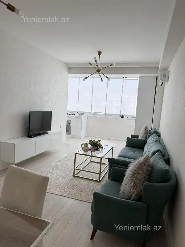 Satılır 2 otaqlı yeni tikili 55 m²