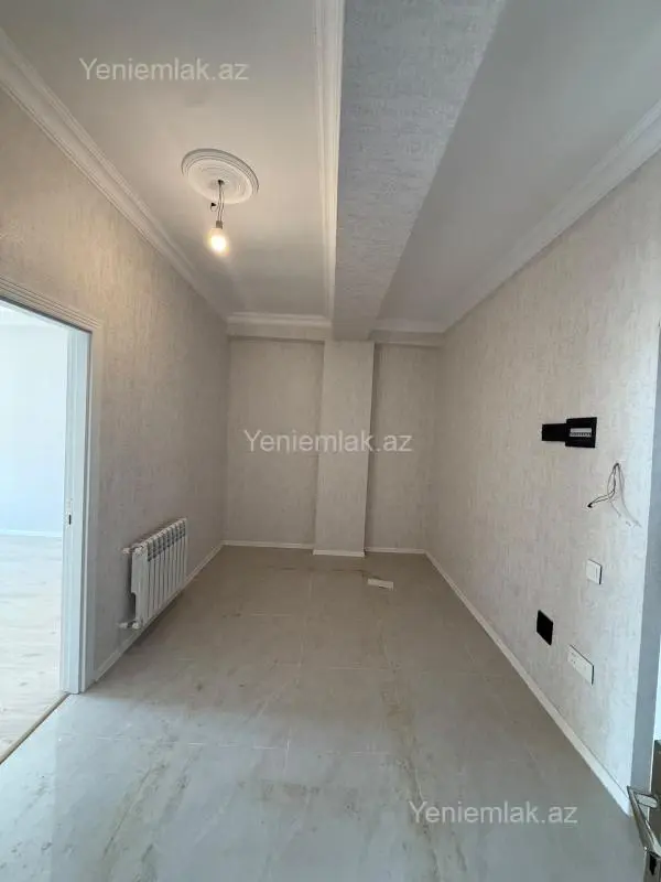 Satılır 2 otaqlı yeni tikili 55 m²