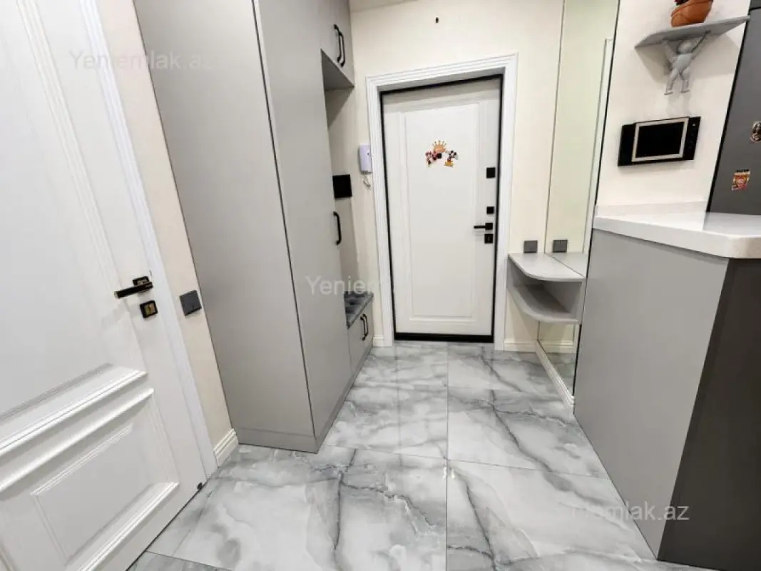 Satılır 2 otaqlı yeni tikili 60 m²