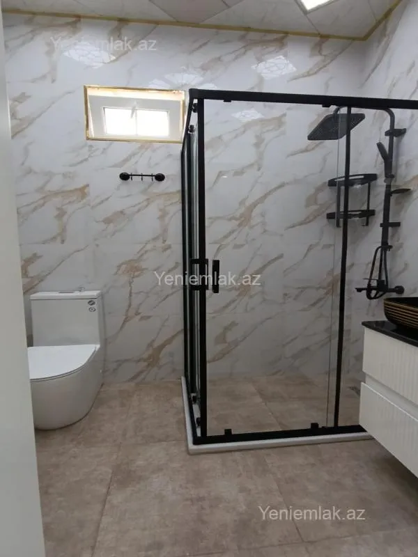 Satılır 7 otaqlı həyət evi 410 m²