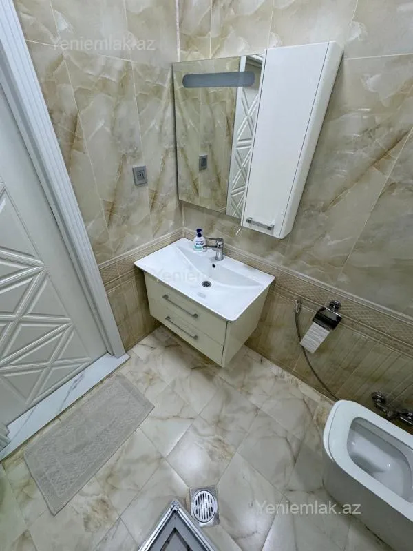 Satılır 2 otaqlı yeni tikili 62.5 m²
