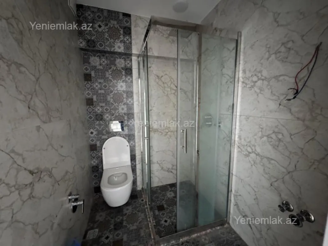 Satılır 2 otaqlı yeni tikili 73.5 m²