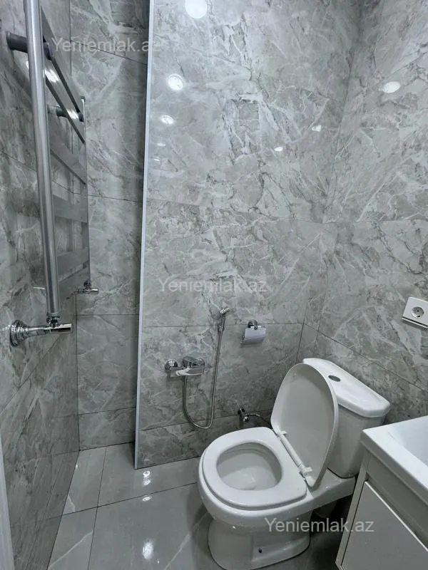 Satılır 2 otaqlı yeni tikili 60 m²