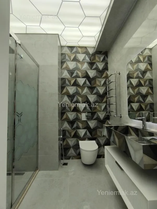 Satılır 3 otaqlı yeni tikili 130 m²