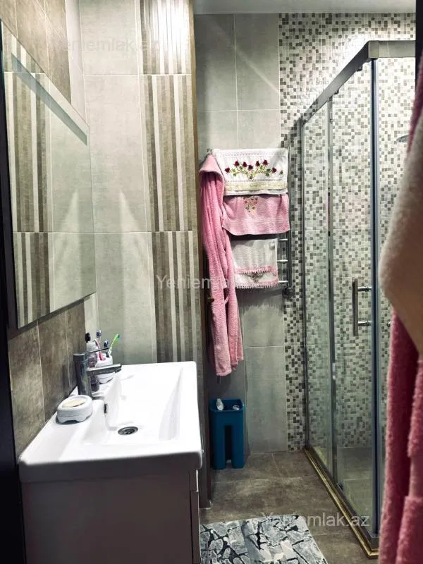 Satılır 2 otaqlı yeni tikili 60 m²