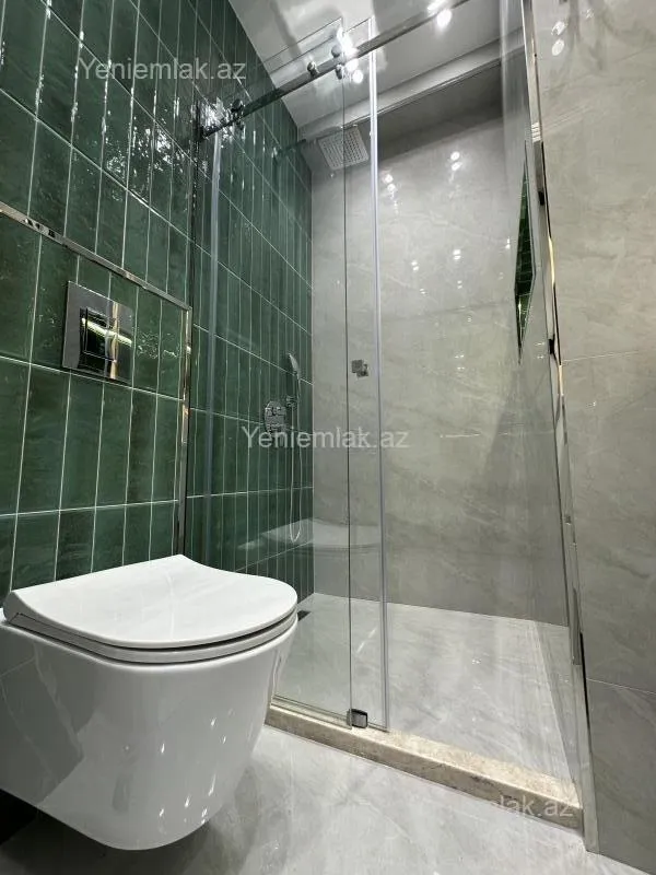 Satılır 2 otaqlı yeni tikili 60 m²