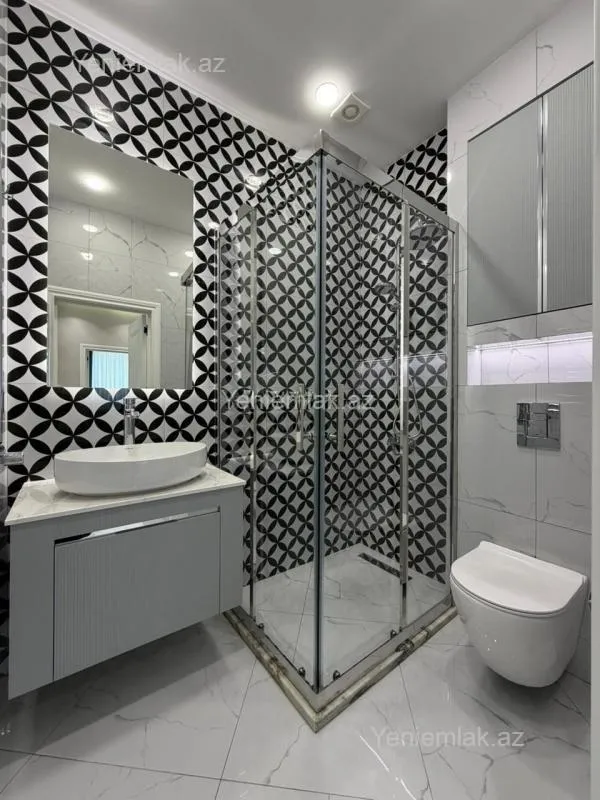 Satılır 3 otaqlı yeni tikili 100 m²