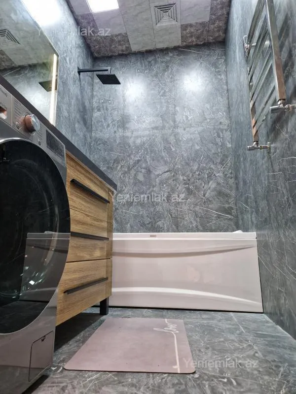 Satılır 2 otaqlı yeni tikili 93.8 m²