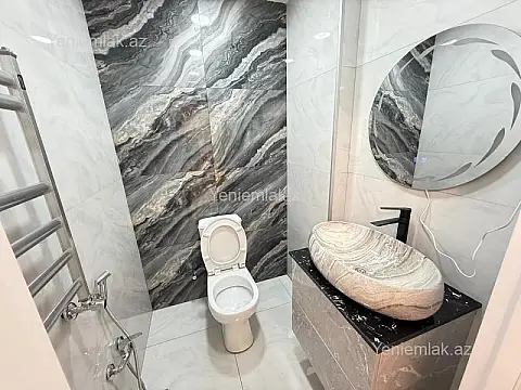 Satılır 3 otaqlı yeni tikili 100 m²