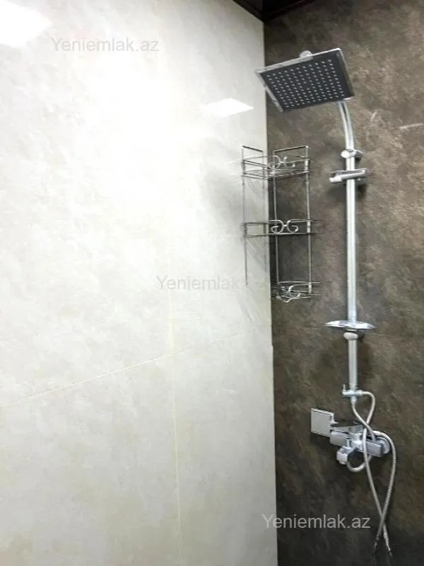 Satılır 3 otaqlı yeni tikili 100 m²