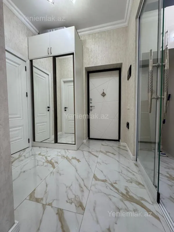 Satılır 2 otaqlı yeni tikili 55 m²