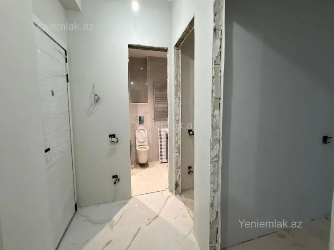 Satılır 2 otaqlı yeni tikili 56 m²