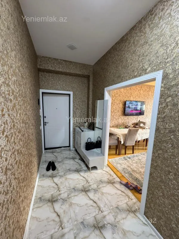 Satılır 2 otaqlı yeni tikili 56 m²
