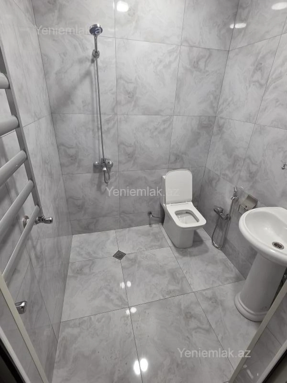 Satılır 2 otaqlı yeni tikili 61.5 m²
