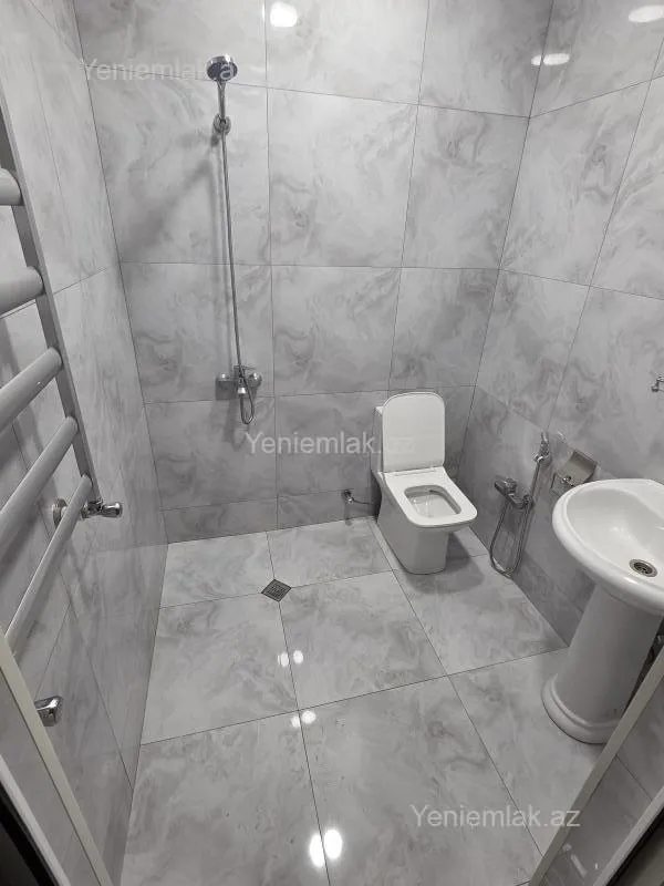 Satılır 2 otaqlı yeni tikili 61.5 m²