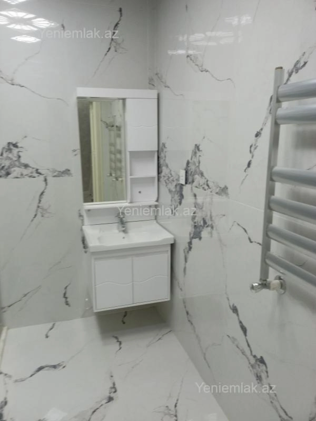 Satılır 3 otaqlı yeni tikili 124 m²