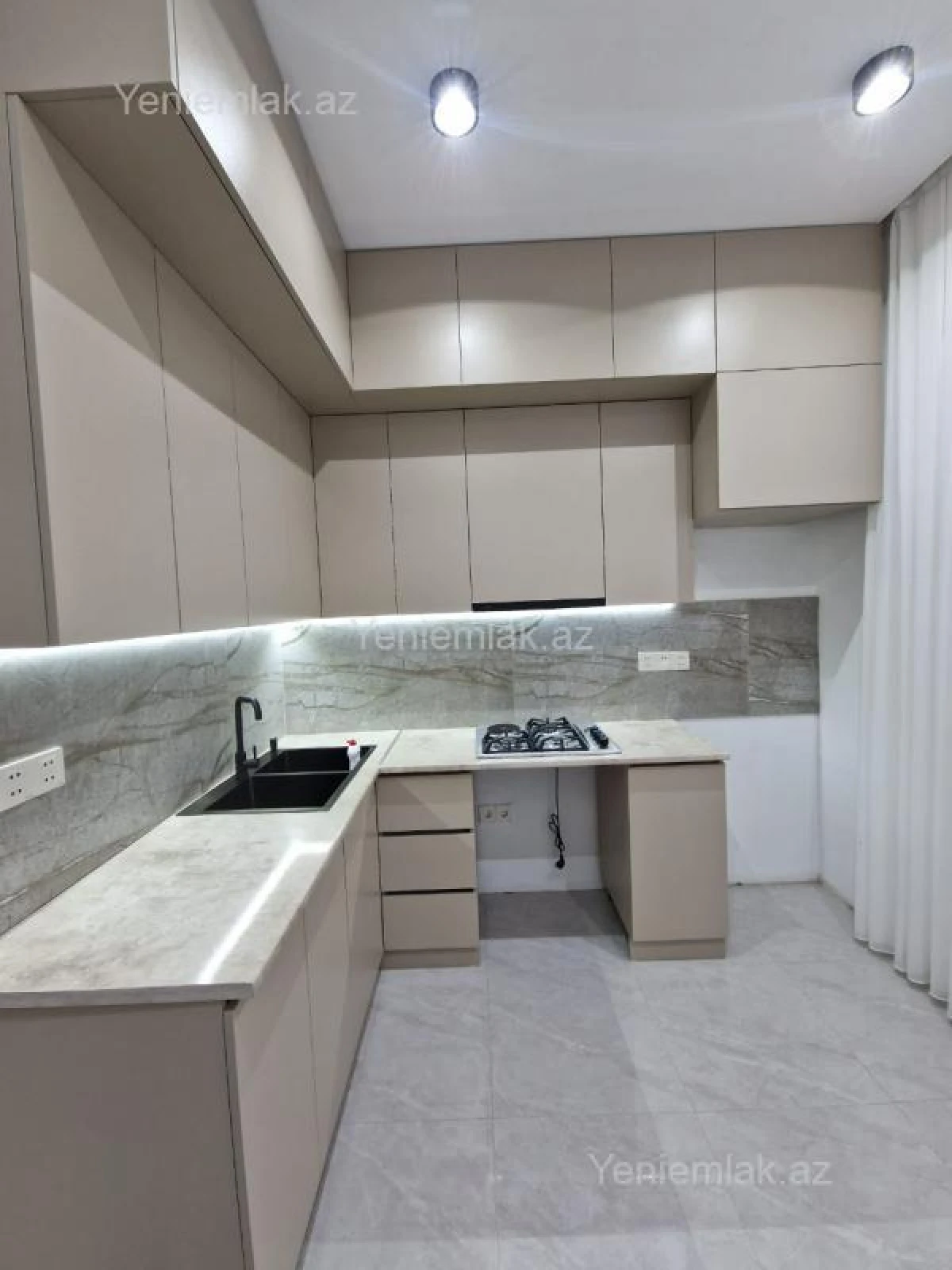 Satılır 2 otaqlı yeni tikili 60 m²
