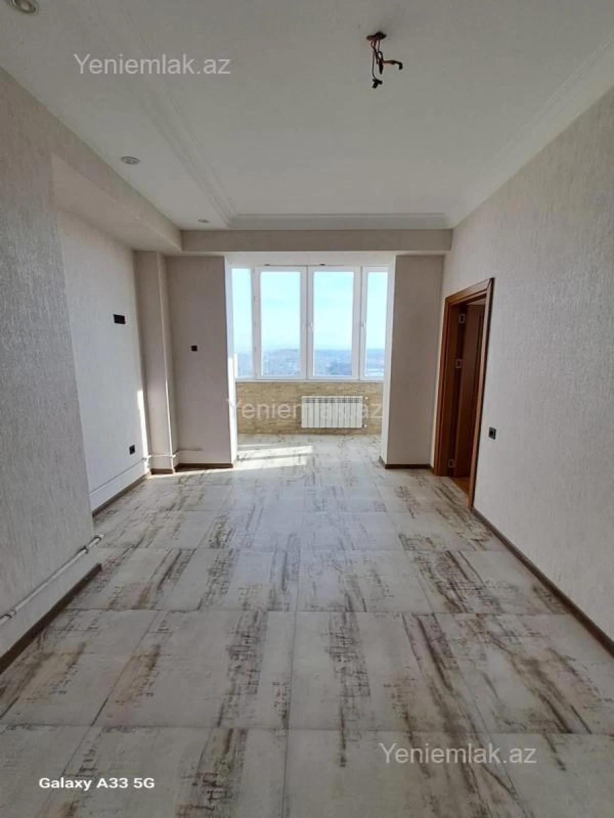 Satılır 2 otaqlı yeni tikili 74 m²