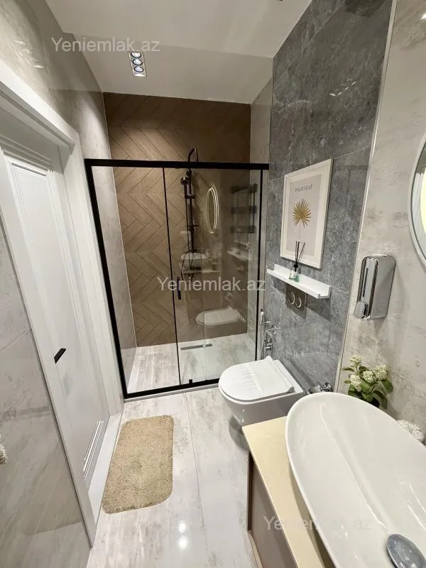 Satılır 2 otaqlı yeni tikili 60 m²