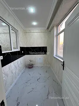 Satılır 2 otaqlı yeni tikili 55 m²