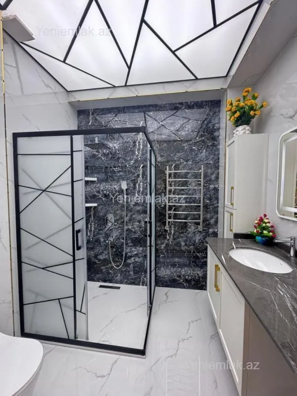 Satılır 4 otaqlı yeni tikili 140 m²