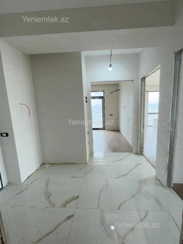 Satılır 2 otaqlı yeni tikili 62.6 m²