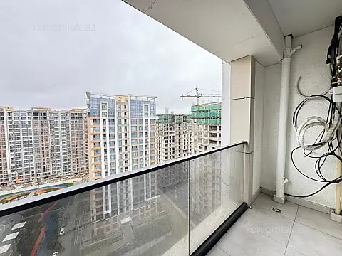 Satılır 2 otaqlı yeni tikili 67.9 m²