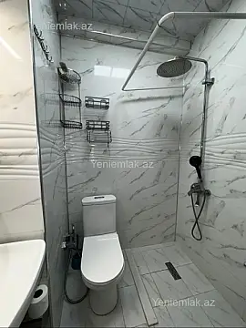 Satılır 2 otaqlı yeni tikili 55 m²