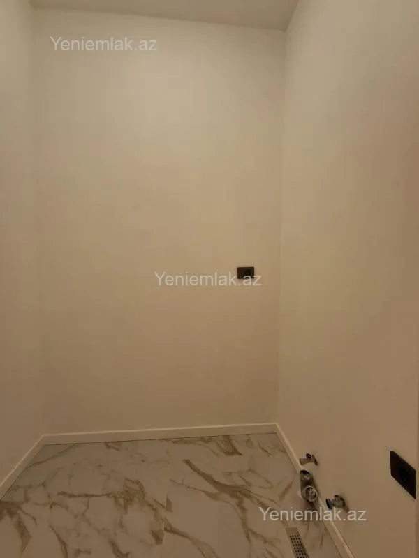 Satılır 2 otaqlı yeni tikili 72 m²