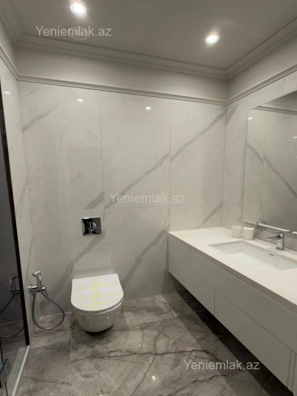 Satılır 4 otaqlı yeni tikili 128 m²