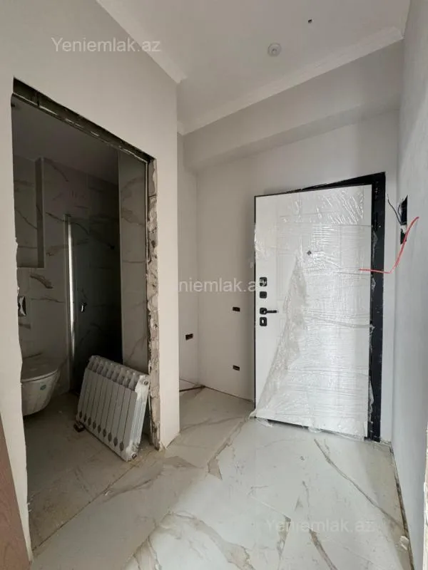 Satılır 2 otaqlı yeni tikili 48.6 m²