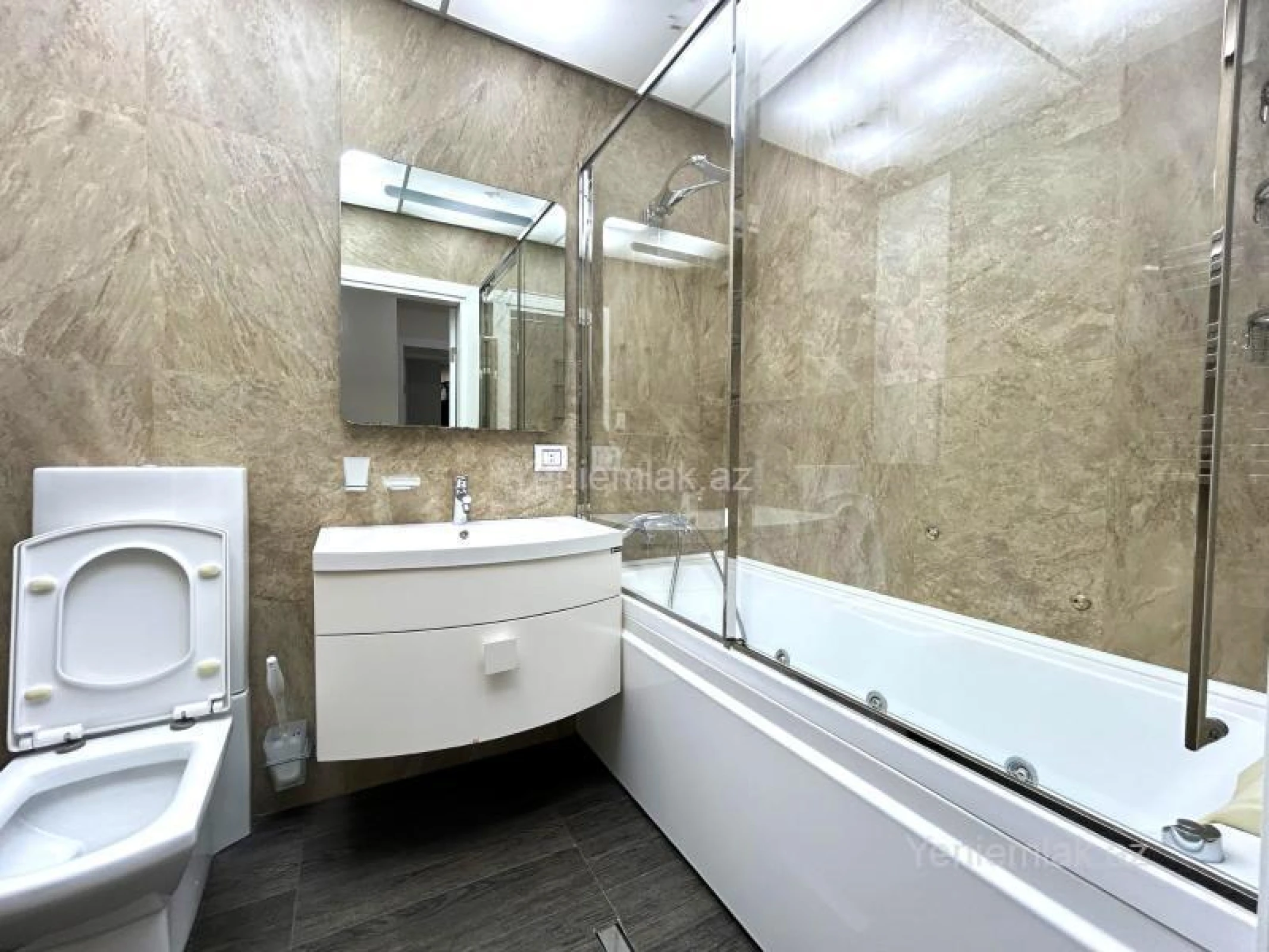 Satılır 3 otaqlı yeni tikili 100 m²