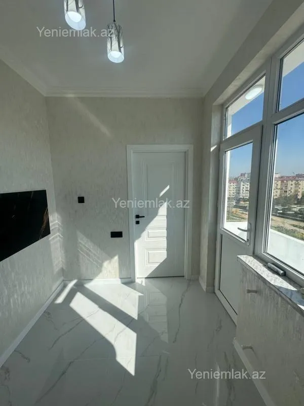Satılır 2 otaqlı yeni tikili 55 m²