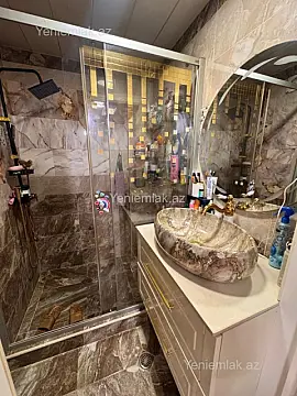 Satılır 2 otaqlı yeni tikili 66.6 m²