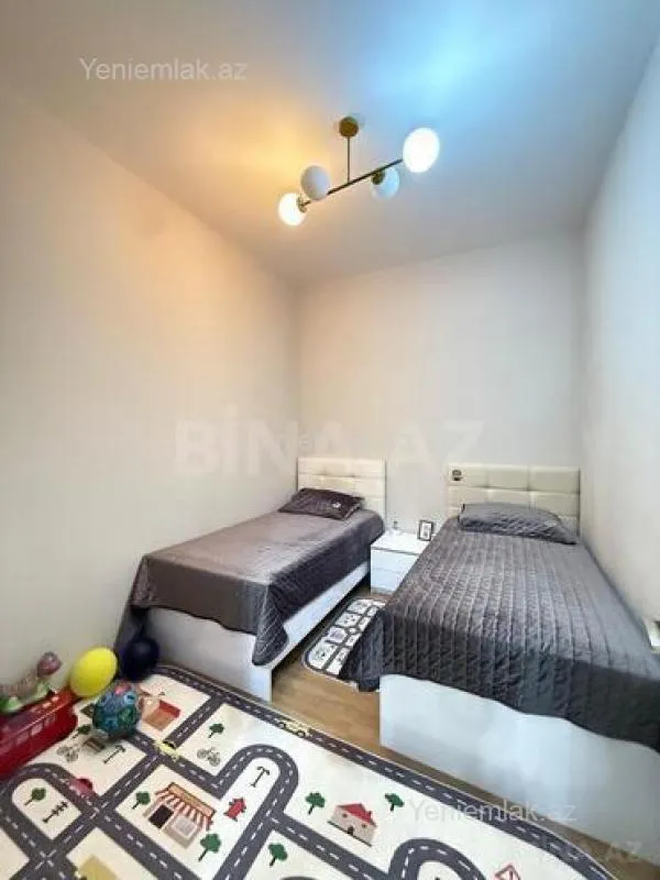 Satılır 4 otaqlı yeni tikili 125 m²