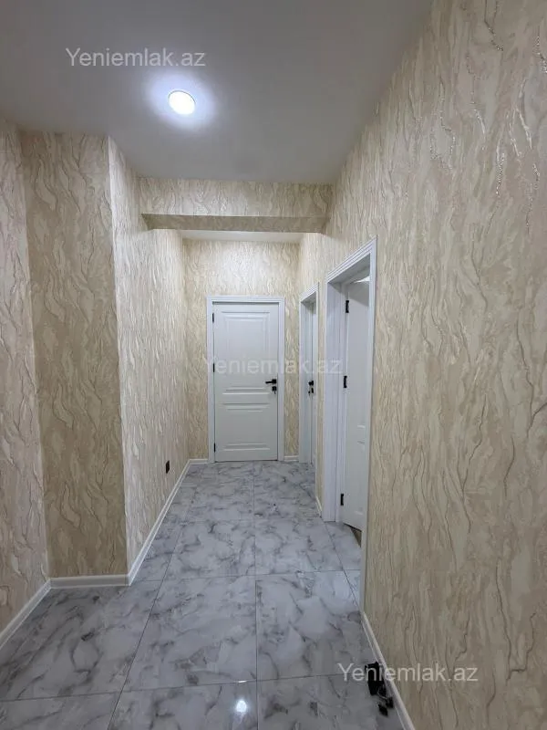 Satılır 2 otaqlı yeni tikili 65.4 m²