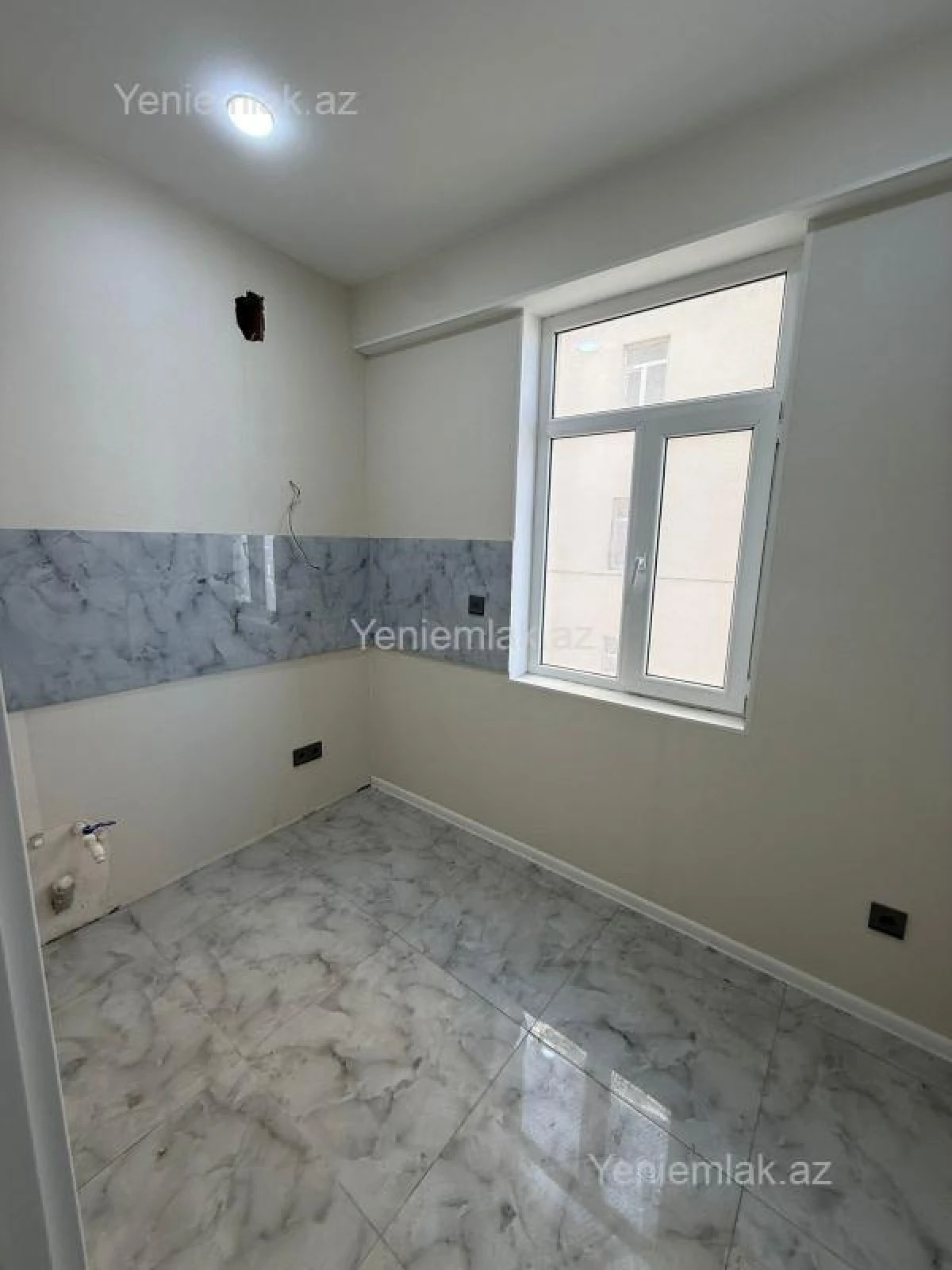 Satılır 2 otaqlı yeni tikili 65.4 m²