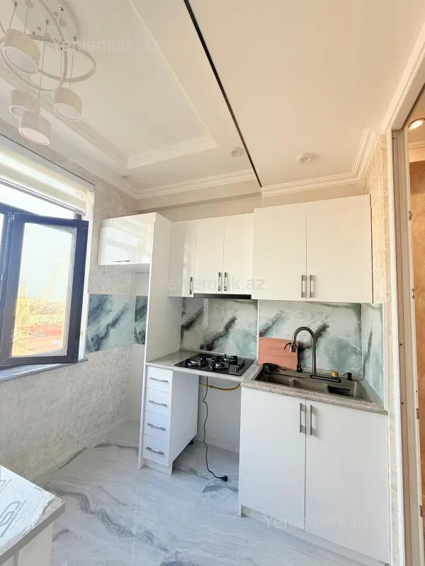 Satılır 2 otaqlı yeni tikili 61 m²