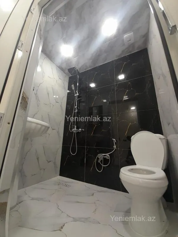 Satılır 2 otaqlı yeni tikili 61.3 m²
