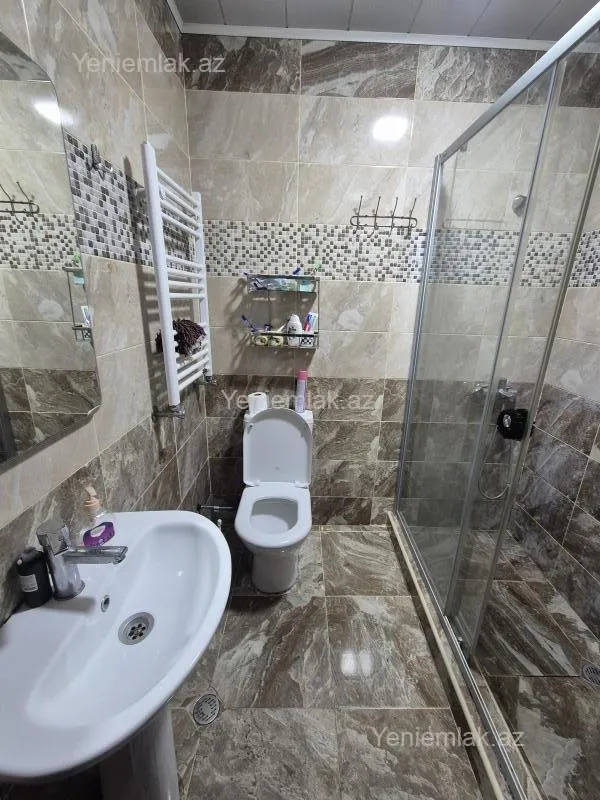 Satılır 2 otaqlı yeni tikili 55 m²