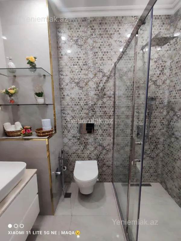 Satılır 3 otaqlı yeni tikili 100 m²